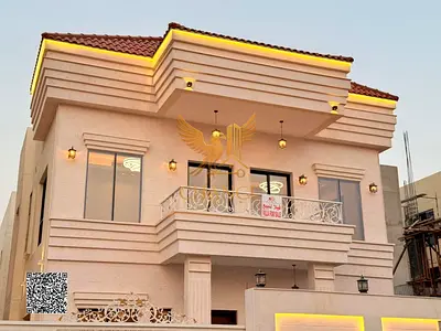 Two-story (classic) villa with a roof for sale in Ajman Price includes registration fees and is neg