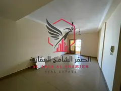 Two-bedroom apartment with a living room in Al Nahda, featuring free parking and a balcony. Prime, v