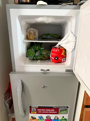 Small upright freezer/refrigerator unit - compact white goods, used