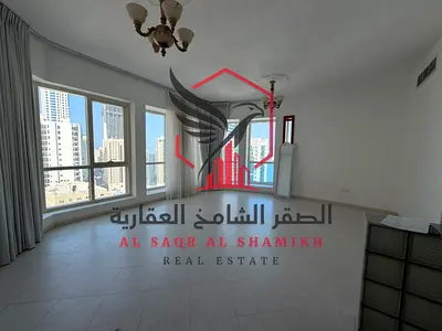 Free AC + 1 month + gym & pool | 1BR + living room + 2 baths + wardrobes | Near Dubai exit & all services.