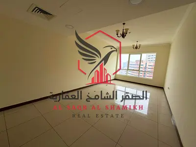 Largest two-bedroom apartment with a balcony, one month's rent + free parking + gym. Master bedrooms with panoramic views. For rent in Al Qasimia.