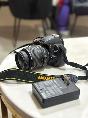 Nikon D3100 DSLR with 18-55mm Kit Lens and Charger - Good Condition negotiable