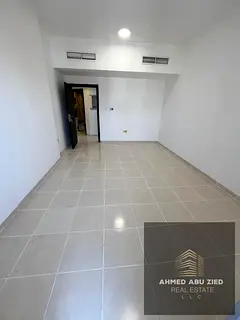 Two-bedroom apartment for annual rent with a balcony and excellent space, located on Al Ittihad Stre