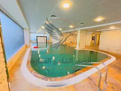 Two-bedroom apartment for annual rent in Al Tallah, Ajman. First occupancy. Free swimming pool. Exce