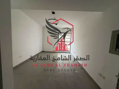 Apartment for annual rent - Al Majaz 2, second occupant, new tower, luxurious decor, spacious areas, open view, free maintenance, central air conditio