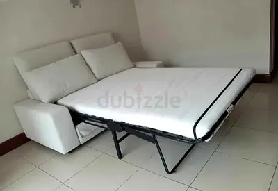 Light grey 2-seater sofa bed with mattress - good condition