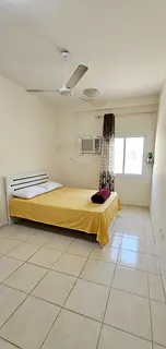 Fully furnished attached room available with parking , near lulu village Muhaisinah 4, GMS school.