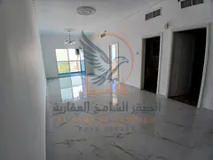 Annual rental apartment on Khalifa Street with 1 bedroom, 2 bathrooms, balcony, city view, parking, 