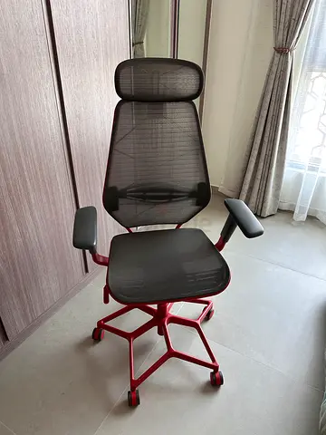 Red IKEA office chair, 2 years old, in very good condition.