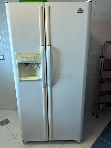 Whirlpool Side-by-Side Refrigerator with Water Dispenser - White