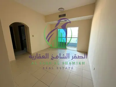 One bedroom apartment with a living room for annual rent in Al Mamzar Sharjah Balcony overlooking Al Khan Corniche Spacious layout Modern finishes Pri