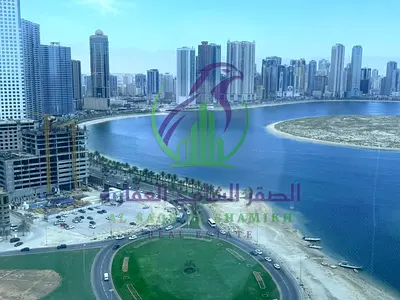 شقة غرفتين وصالة للايجار على كورنيش الخان بإطلالة بحرية مباشرة وجميع الغرف مطلة على البحر مع باركينغ