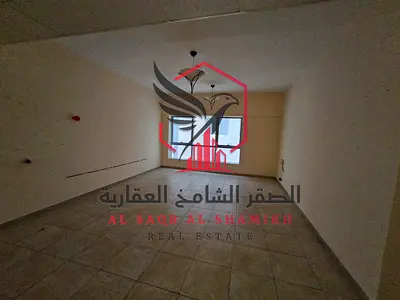 1BR apartment in Al Majaz 2 with free AC, free gym, swimming pool, and free kids' play area. Prime location near all services with easy access to Duba