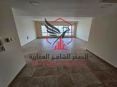 Apartment for annual rent - Al Majaz 2. Features include air conditioning, gym, swimming pool, free 