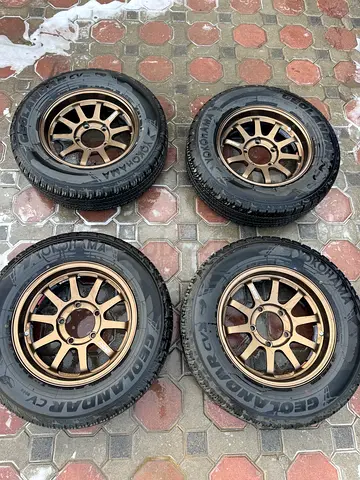 رنقات رايز اصليات قياس 16 مع تواير يوكاهاما جولندر حجريات/rays rims original size 16 with Yokohama