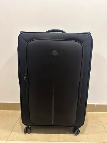 Delsey Large Suitcase with lock - Urgent sale negotiable - Works fine just one wheel not so much