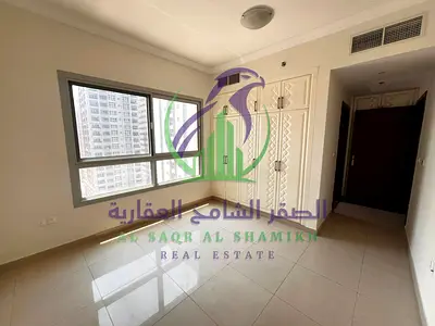 شقة غرفتين وصالة بالتعاون مع غرفة ماستر وخزائن حائط وبلكونة وباركينغ وجيم مجاني للإيجار السنوي