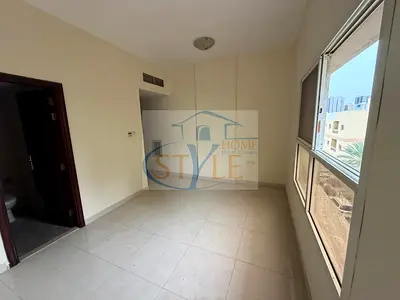 Studio for rent: separate kitchen, central air conditioning, spacious layout.