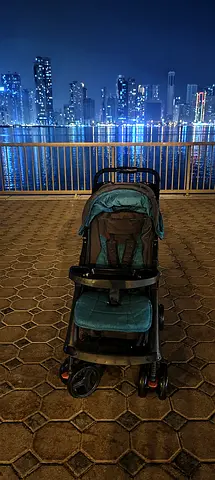 Lightweight teal baby stroller - compact fold, good condition
