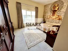 The apartment consists of two bedrooms and a living room, offering a spacious area of 1,450 square f
