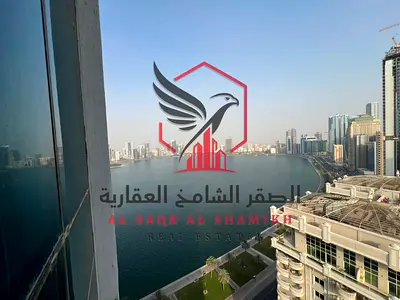 Panoramic sea view, free air conditioning, free parking, two large bedrooms and a living room, balcony, maid's room, and laundry room for rent in Al K