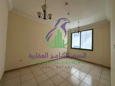 Two Bedroom Apartment for Annual Rent in Al Majaz Sharjah with Balcony and Built in Wardrobes in a Quiet Family Building