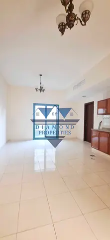 Very hot offer STUDIO AVAILABLE CANTRAL AC CANTRAL GAS WITH BALKANY AND PARKING BUILDING JUST 22K IN AL QASIMIA