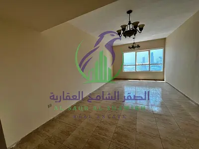 غرفتين وصاله للايجارالسنوى منطقة التعاون بإمارة الشارقه تكيف مجانى جيم ومسبح مجاني  باركن مجانى بلكونه اطلاله مفتوحه  غرفه غسيل
