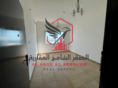 Open view two-bedroom apartment with a master layout, free air conditioning and parking, located in the finest towers of Sharjah
