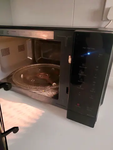 Used built-in microwave oven with touch control and turntable 25L