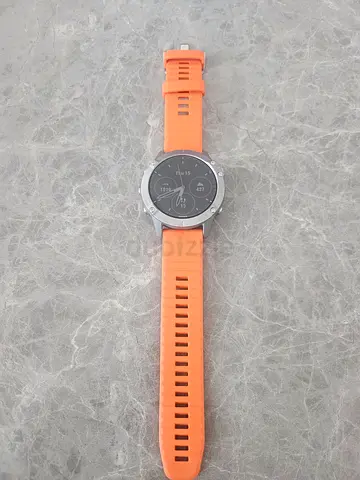 Used Garmin Fenix 6-style Sports Smartwatch with Orange Silicone Strap