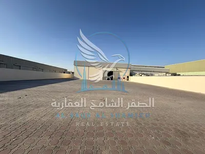 Yard for rent in Industrial Area 18, featuring a warehouse and a prime location.