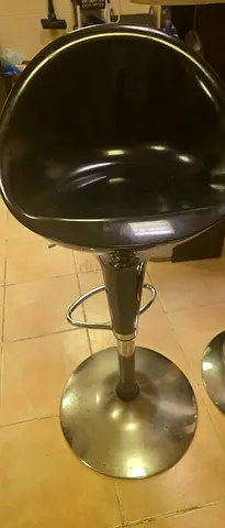 Black adjustable bar stool with chrome base