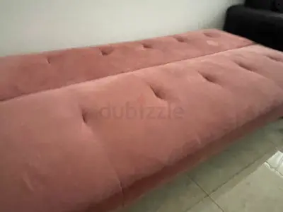 Long upholstered pink bench / daybed - good used condition