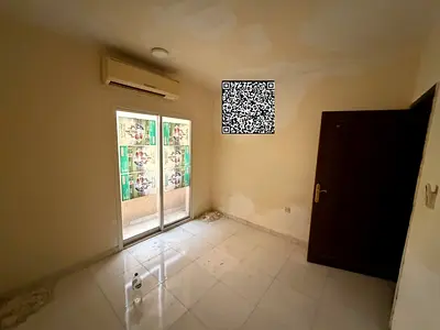 For annual rent in Ajman, opposite Thumbay Hospital: 2 rooms, a living area, and 2 bathrooms. Strictly for bachelors.