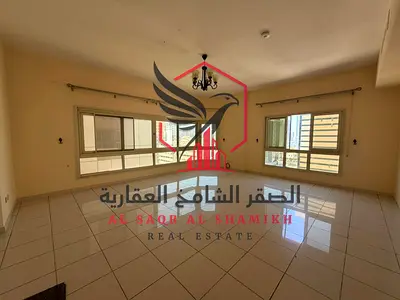 Apartment for annual rent in Al Majaz 1. Free air conditioning. Large 3 rooms. Spacious layout. Open view. Free maintenance. Central air conditioning.