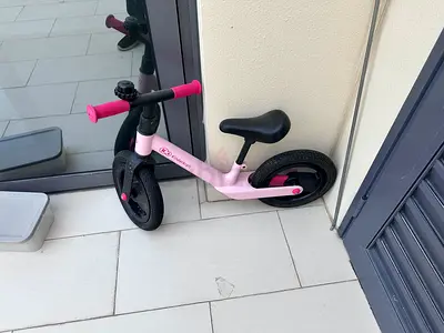 Pink toddler balance bike / run bike - lightweight and good condition