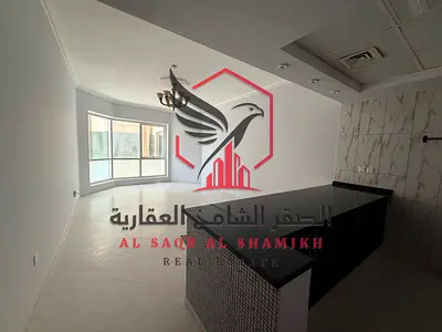 اجمل تصميم مطبخ امريكي لغرفة وصالة  بشهر مجانا والتكييف علي المالك وجيم ومسبح مجانا أجمل ابراج الشارقة شامل جميع الخدمات بتشطيب حديثة ومساحات واسعة.