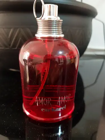 Amor Amor perfume bottle - red fragrance bottle