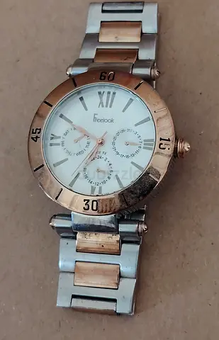Freelook two-tone women's wristwatch - pre-owned
