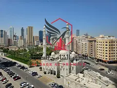 Two-bedroom apartment with a living room and a balcony overlooking Al Safya Park, in one of the most
