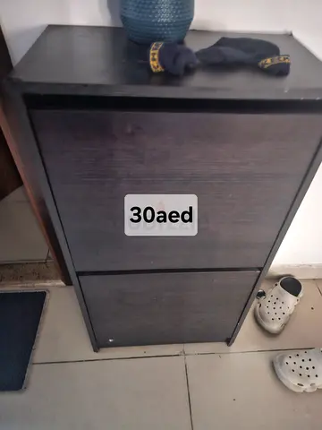 Ikea bissa Compact 2-Drawer Shoe Cabinet - Dark Wood Finish (30 AED)