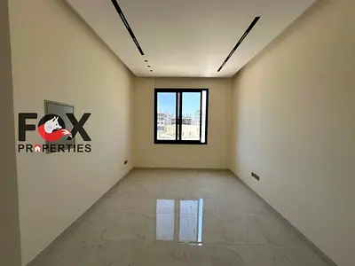 A fancy room and living room for annual rent in Al Jurf 3 area,close to Dubai and Sharjah exit.First-time occupancy building,one month free,2 bathroom