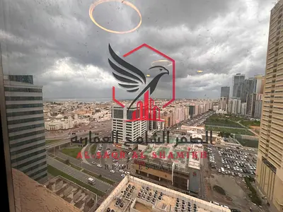اجمل اطلالة باكبر غرف وصالة ماستر بباركن مجانا في أجمل ابراج الشارقة شامل جميع الخدمات بتشطيب حديثة ومساحات واسعة.