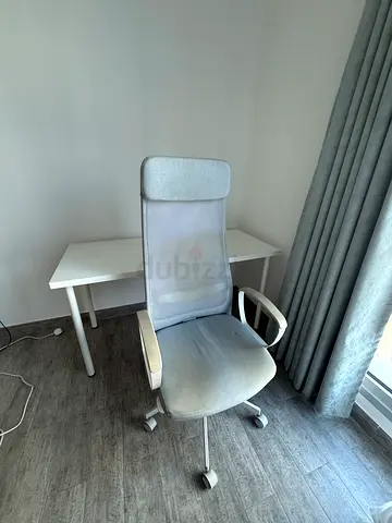 IKEA Light grey ergonomic office chair with armrests and wheels