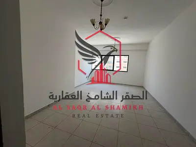 Annual rental in Al Qasimia Al Nad: Spacious 2BR hall, open view, built-in wardrobes, free gym, modern finishing, and family-friendly tower.