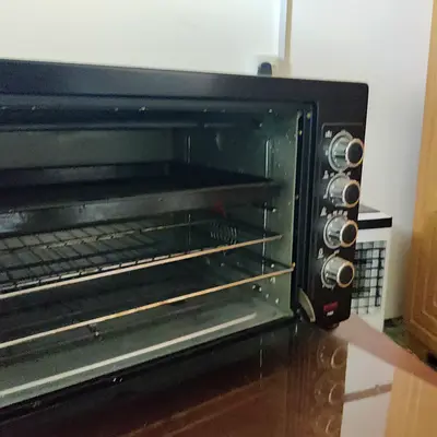 Used countertop electric oven with multiple racks - good working condition