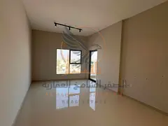 Annual rental apartment in Al Hamidiya 1 with 2 bedrooms, living room, 2 bathrooms, balcony, built-i