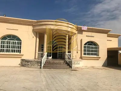 Ground floor villa for rent in Ajman Al-Jarf 1 area 15 thousand feet 4 rooms + council + hall dining room places for agriculture very large monsters interior parking covered required 80 thousand dirha
