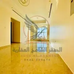 Annual rental apartment in Al Rawda, four bedrooms, master rooms, five bathrooms, private parking, f